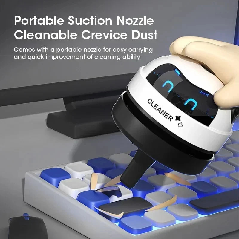 Handheld Mini Vacuum Cleaner Home Office Desktop and keyboard